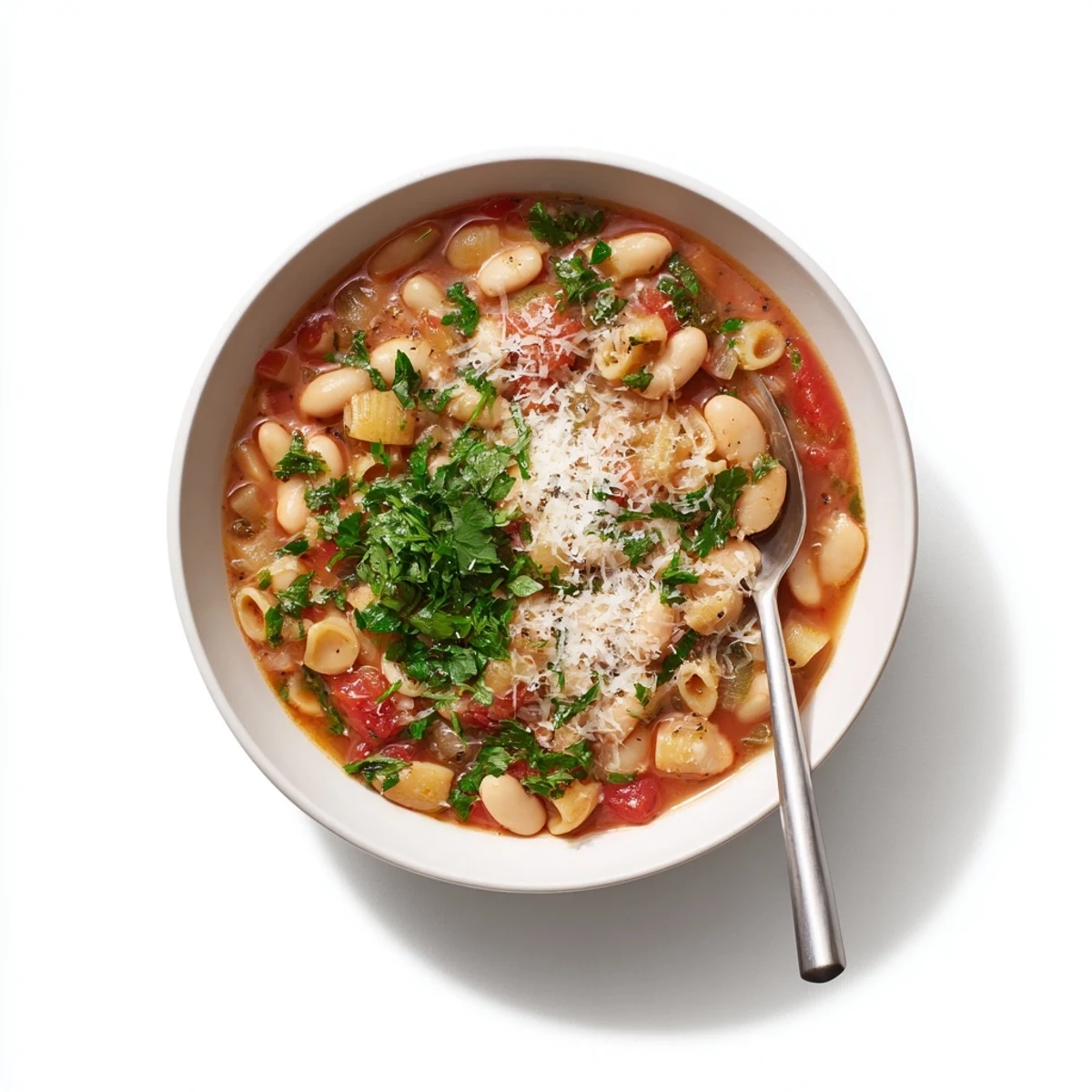 Hearty Italian Pasta e Fagioli Soup with visible pasta shapes and a rich, tomato-based broth looks delicious.