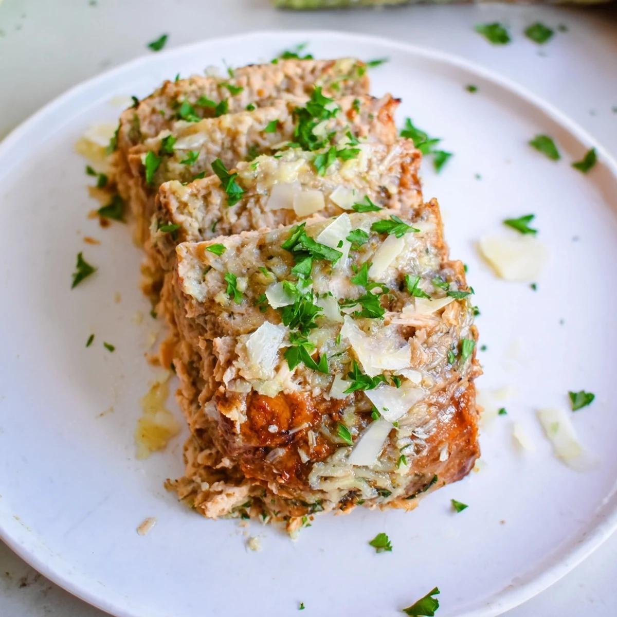 Golden, crusty Juicy Garlic Parmesan Chicken Meatloaf, bubbling with a savory Parmesan glaze just baked.