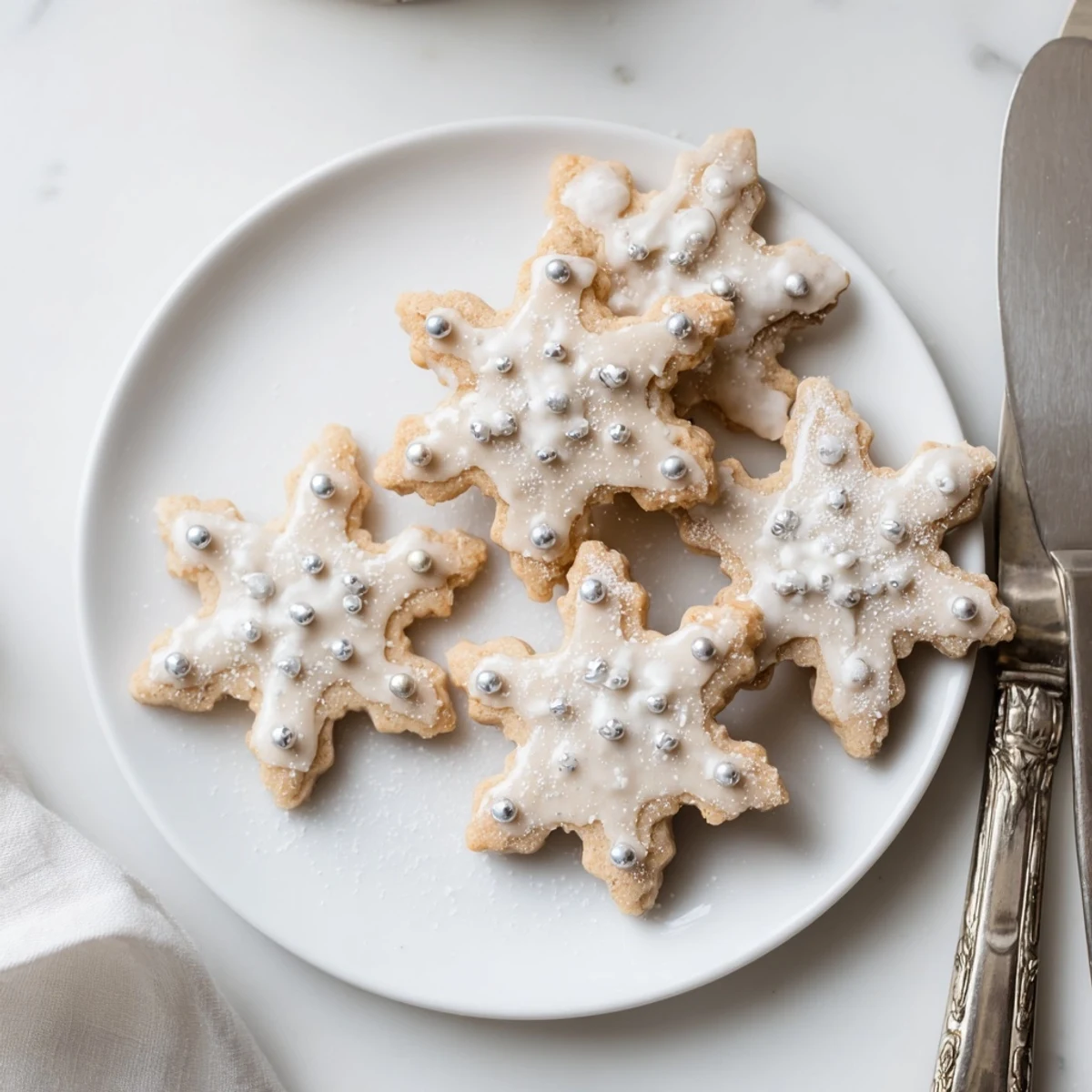 These crisp and buttery Winter Snowflake Platter treats are lightly dusted, ready to complement warm drinks.