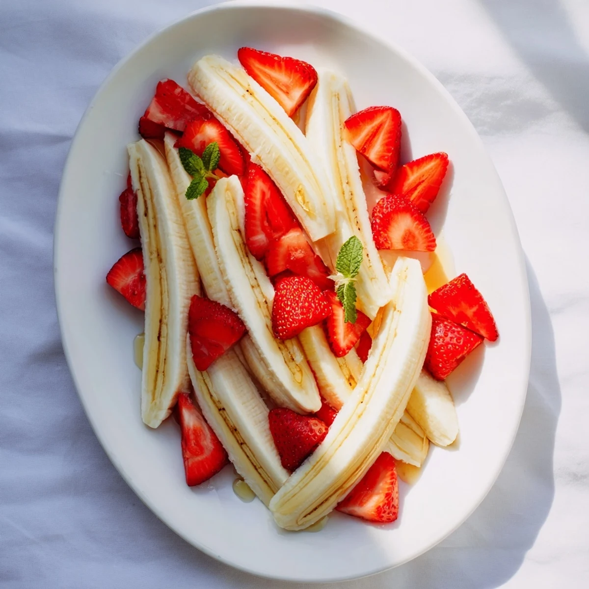 Sweet, vibrant Banana Strawberry Candy Cane: A visually appealing, refreshing American treat ready to enjoy.