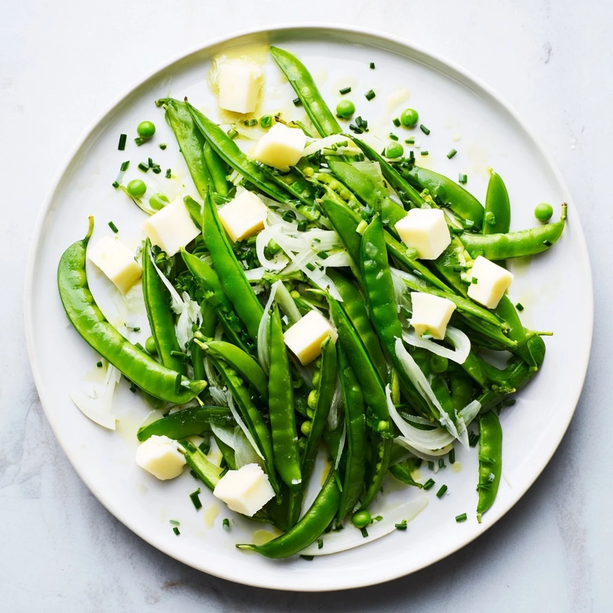 Fresh, vibrant The English Ivy salad with snap peas, green beans and white cheddar; perfect for summer.