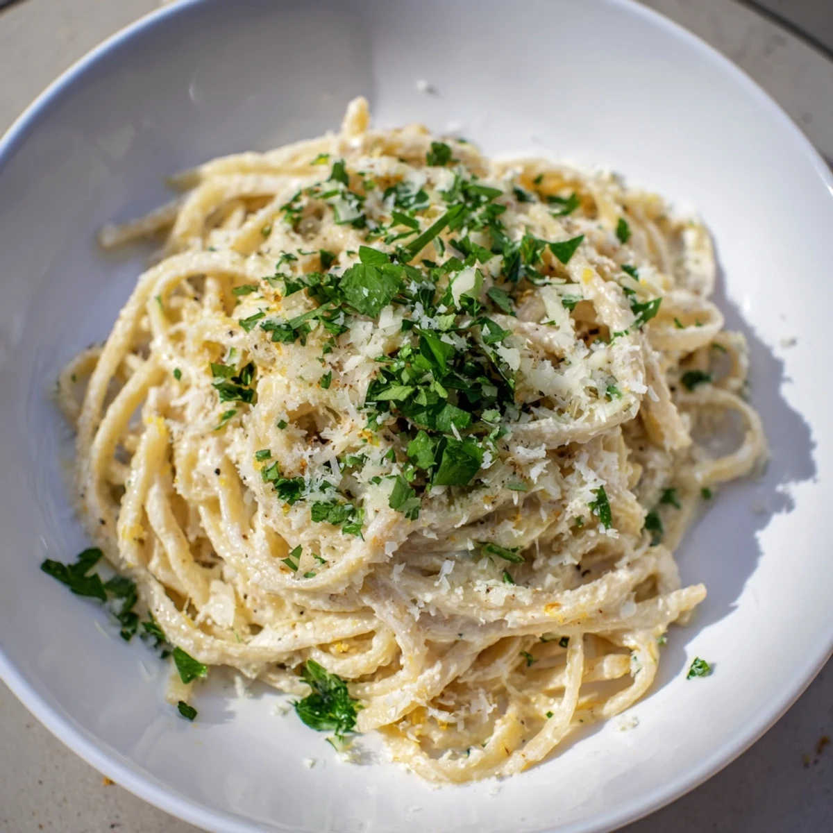 Linguine smothered in Lemon-Garlic Greek Yogurt Pasta, a quick and refreshing vegetarian dinner idea.