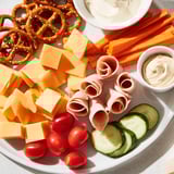 This Renard Rusé Snack Assortment features an inviting arrangement of sweet and savory treats for your guests.