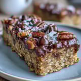 Sliced bars showing banana and walnut chunks in a hearty texture, perfect for a protein-packed breakfast