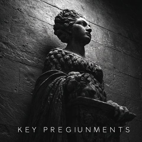 A hearty bowl of beef and barley soup with mushrooms, featuring tender chunks and a rich, brown broth.