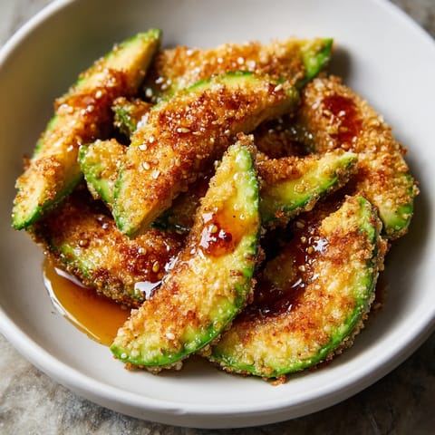 Crispy Avocado Slices with Hot Honey Drizzle.