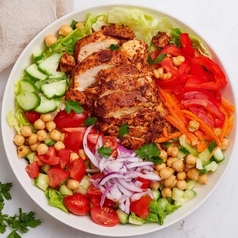 Fresh and colorful chicken salad, featuring roasted chicken, crisp veggies, and a tangy dressing.