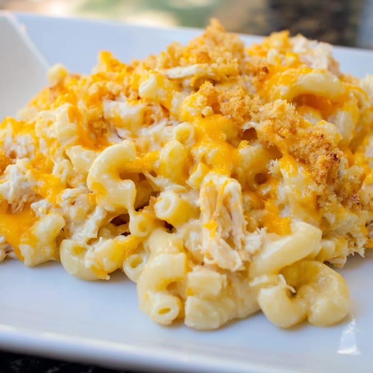 Hearty Classic Mac & Cheese with BBQ Chicken topped with crispy panko breadcrumbs.  