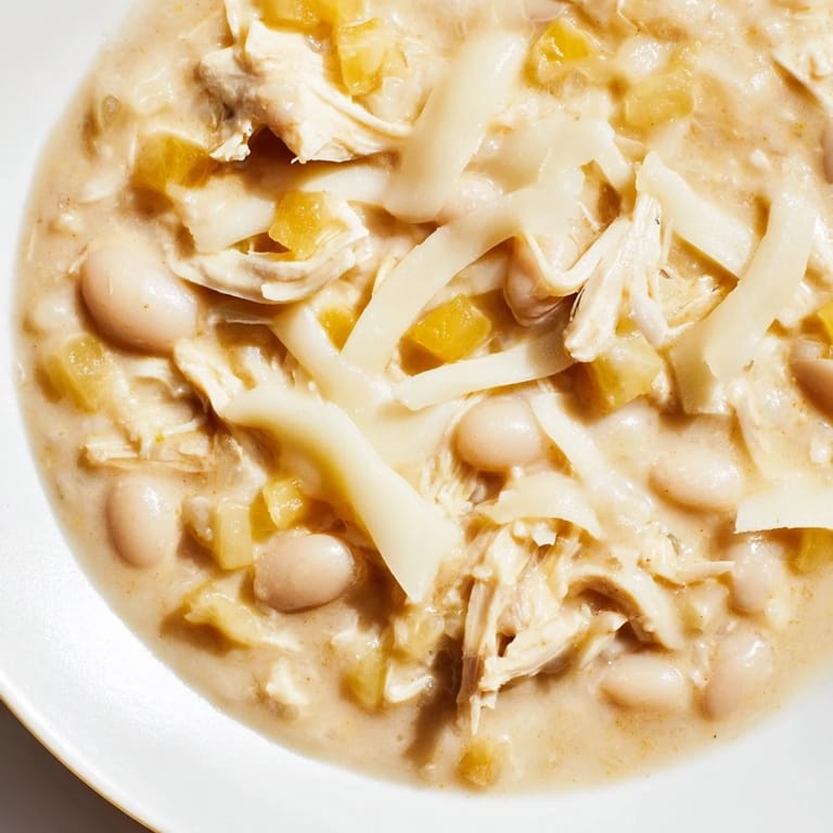 Delicious homemade 35-Minute White Cheddar Apple Chicken Chili with visible chunks of apple and chicken.