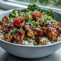 Vibrant Low Calorie High Protein Meal Prep bowls with colorful roasted vegetables and tender chicken.